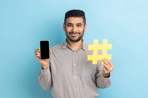 Portrait Delighted Bearded Businessman Holding Yellow Hashtag Smart Phone Blank — Stok fotoğraf