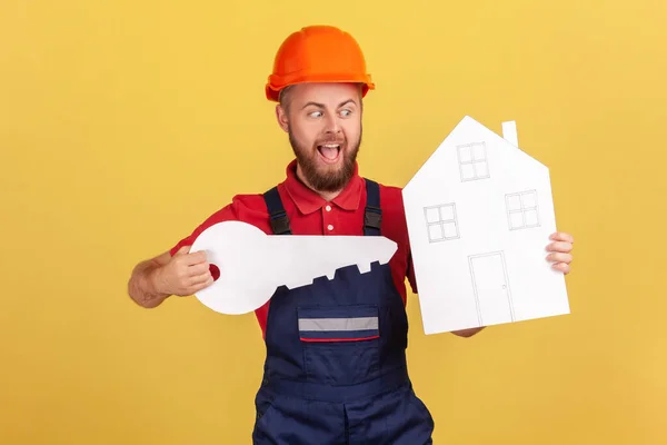 Portrait Excited Worker Man Holding Big Paper Key House Hands — Stock Fotó