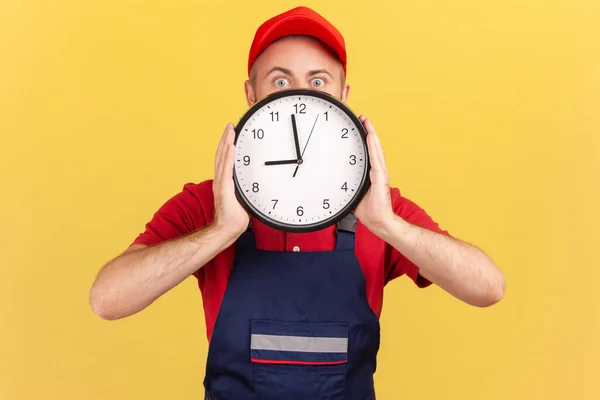 Unknown Worker Man Covering Half Face Big Wall Clock Work — Stockfoto