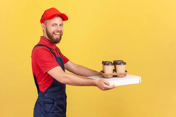 Side View Portrait Happy Deliveryman Standing Pizza Box Coffee Disposable — Stock Fotó