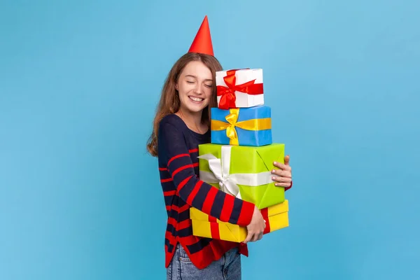 Pleased Happy Woman Wearing Striped Casual Style Sweater Holding Many — Fotografia de Stock