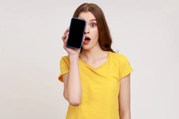 Portrait Excited Shocked Teenager Girl Wearing Yellow Shirt Covering Half — Foto Stock