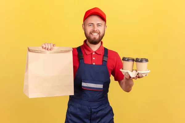 Portrait Happy Smiling Bearded Deliveryman Wearing Uniform Holding Paper Package — Stockfoto