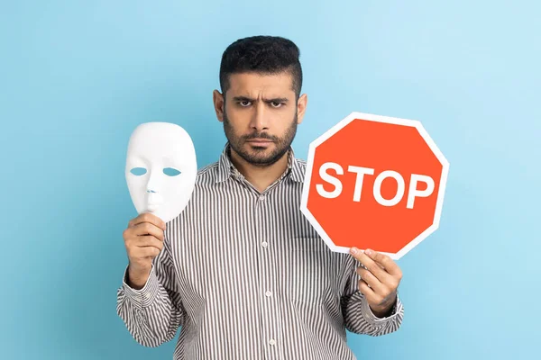 Portrait Serious Businessman Holding White Mask Unknown Face Red Traffic — Stock Photo, Image