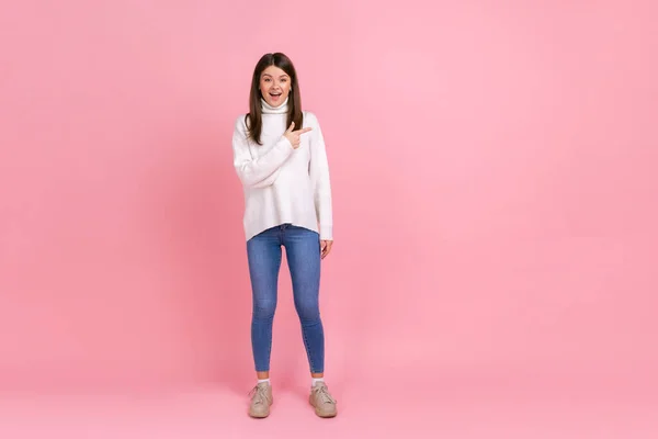 Full Length Portrait Excited Female Pointing Finger Aside Showing Copy —  Fotos de Stock