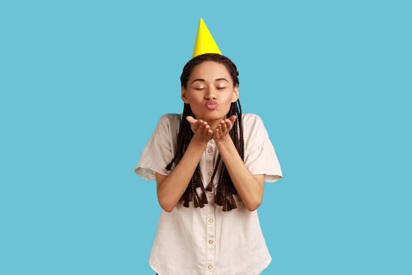 Charming Romantic Woman Party Cone Hat Blowing Air Kissing Palms — 스톡 사진