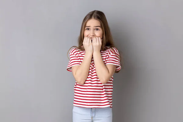 Portrait Dark Haired Nervous Adorable Little Girl Wearing Striped Shirt — Stock fotografie