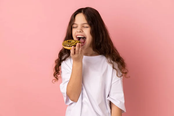 Sugar Addiction Portrait Satisfied Little Girl Wearing White Shirt Biting — Stock Photo, Image