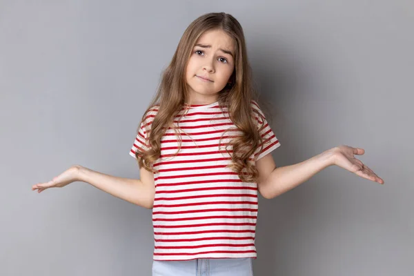 Don Know Portrait Ambiguous Little Girl Wearing Striped Shirt Shrugging — Stock Photo, Image