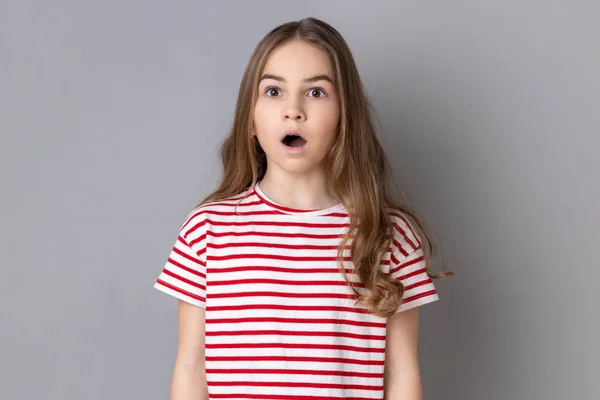 Portrait Astonished Surprised Little Girl Wearing Striped Shirt Looking Shocked — Stock Photo, Image