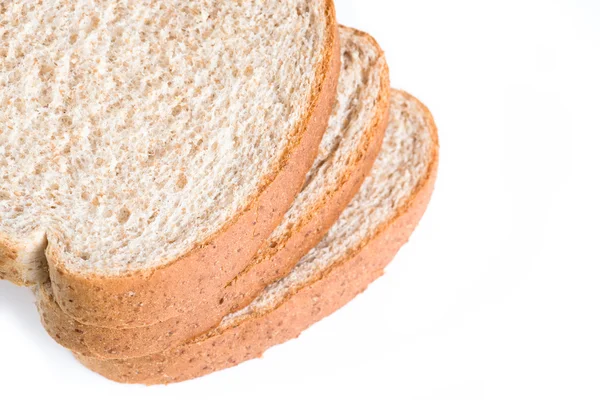 Stacked whole wheat bread slices — Stock Photo, Image