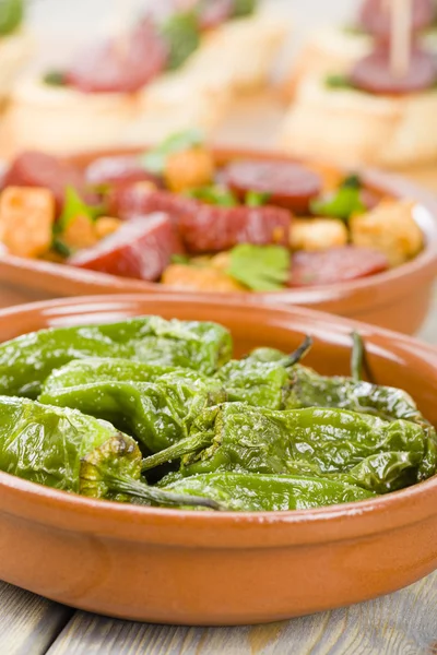Chorizo and Bread and Padron Peppers — Stock Photo, Image