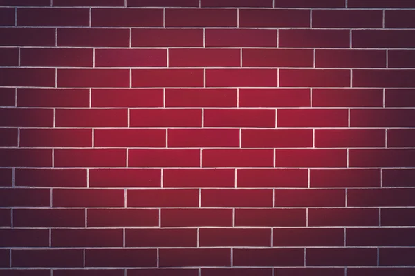 Fondo de una pared de ladrillo rojo oscuro — Foto de Stock