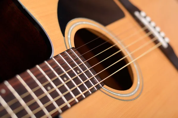 Acoustic guitar with shallow depth of field Stock Image