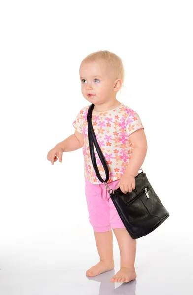 Bambino con una borsa su sfondo bianco — Foto Stock