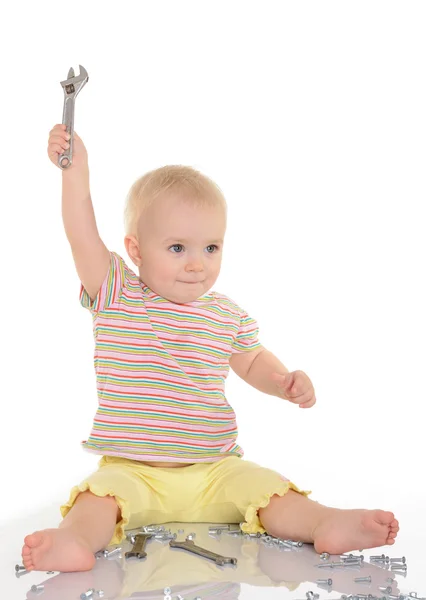 Baby with tools on white background — Stock Photo, Image