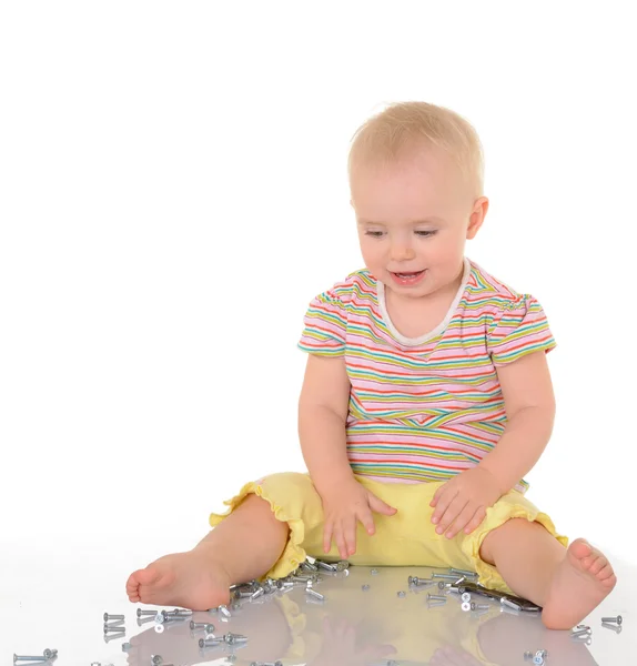 Baby with tools on white background — Stock Photo, Image