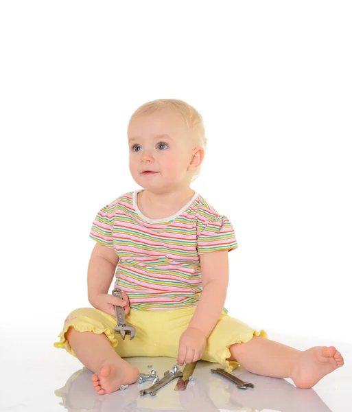 Baby with tools on white background — Stock Photo, Image