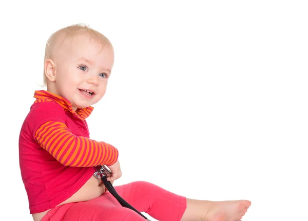 Dolce bambina con fonendoscopio isolato su un backgroun bianco — Foto Stock