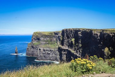 World famous cliffs of moher in county Clare Ireland. Scenic Irish rural countryside nature along the wild atlantic way and European Atlantic geotourism route