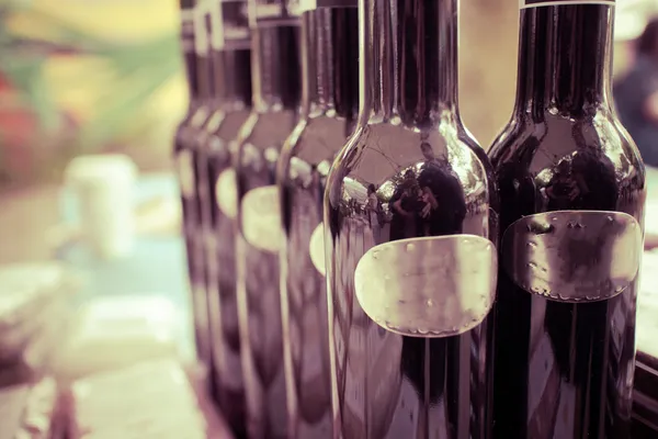 Wine bottles at craft fair — Stock Photo, Image