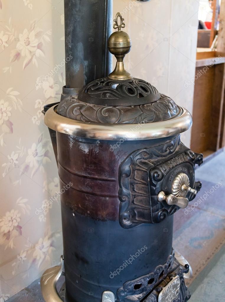 An old cast iron stove — Stock Photo © alamourus 27635285