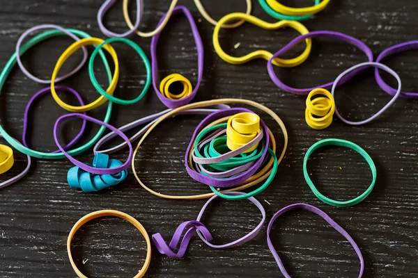 Elastic bands and homemade tools for crafting and homework