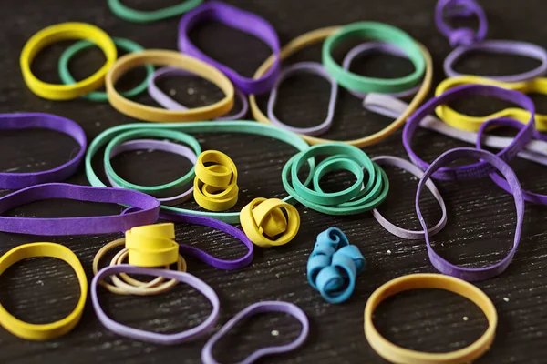 Elastic bands and homemade tools for crafting and homework