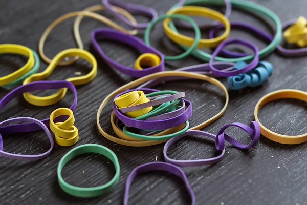 Elastic bands and homemade tools for crafting and homework