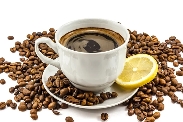 Tazza di caffè con grani Foto Stock