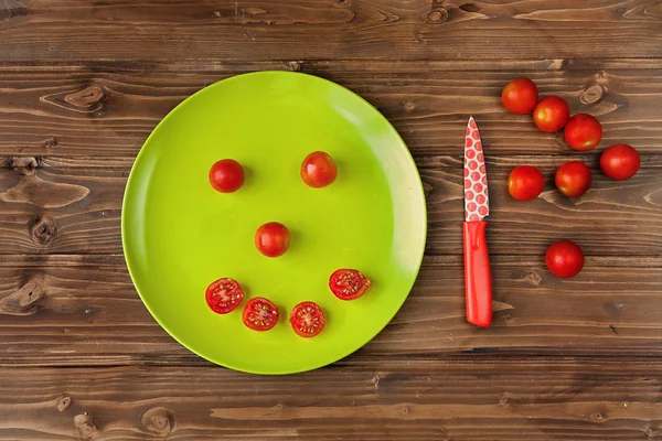 Счастливые помидоры черри Стоковая Картинка