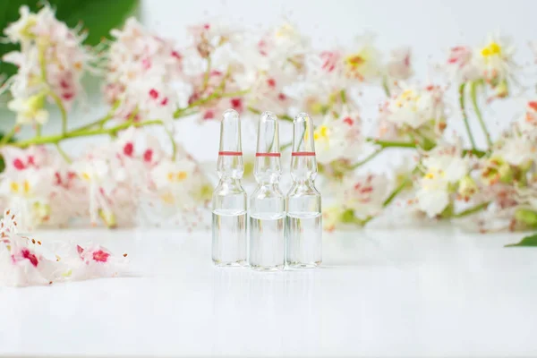 Bottle Horse Chestnut Extract Essence Chestnut Flowers Flowering Branches Leaves — Stock Photo, Image