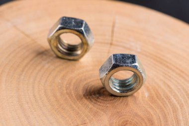 Nut two insulated on wood