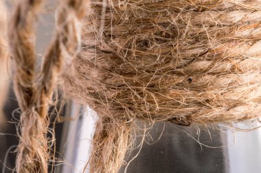 bast rope around a bottle neck