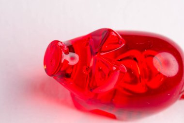 red pig made of plastic as mascot