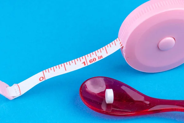 Homeopathic Tablet Red Spoon Measuring Tape — Stock Photo, Image