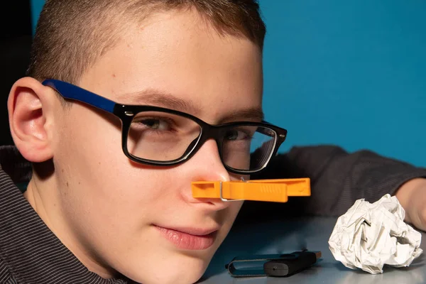 Boy Glasses Only Face Front Clothes Peg His Nose Paper — Stock Photo, Image