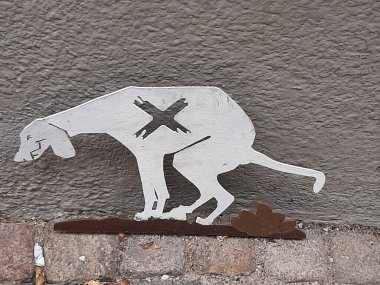 Sign of a shitting dog crossed out