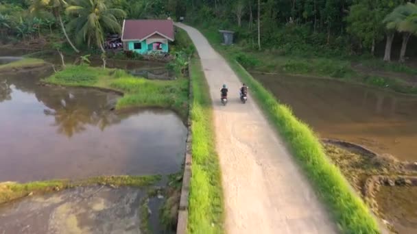 Drone Footage Two Mopeds Driving Country Road Small Village Philippines — Wideo stockowe