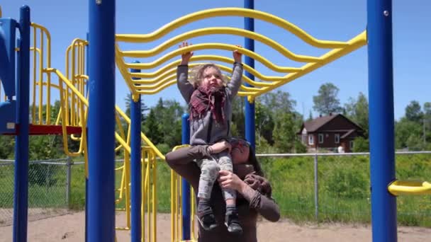 Slow Motion Video Front Happy Mother Lifts Two Year Old — Video