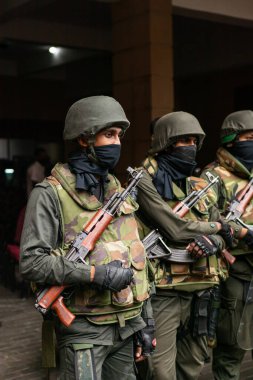 COLOMBO, SRI LANKA: 9th July 2022: Sri Lanka Special Task Force armed riot police stand in camouflage during mass protest at Presidential Secretariat.