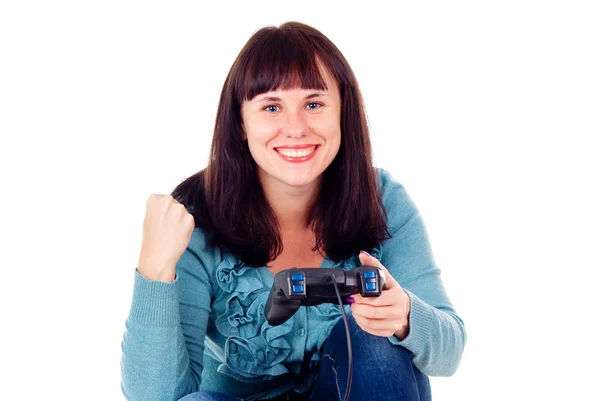 Una chica jugando videojuegos, regocijando la victoria — Foto de Stock