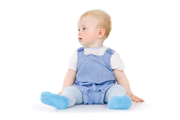 Baby sitting looking in the direction — Stock Photo, Image