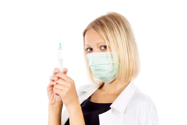 Beautiful girl nurse holding the syringe — Stock Photo, Image