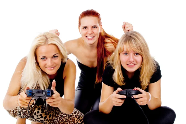 Las tres chicas juegan videojuegos — Foto de Stock