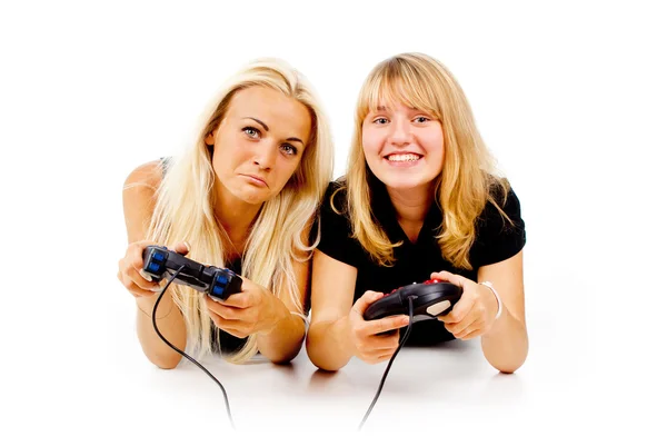The two girls are unhappy with video games — Stock Photo, Image