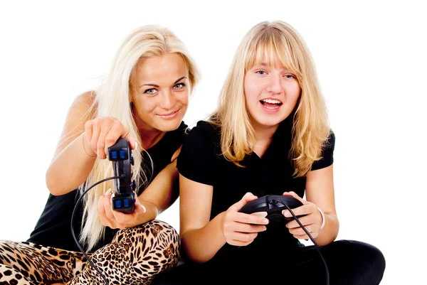 Duas meninas jogar jogos de vídeo — Fotografia de Stock