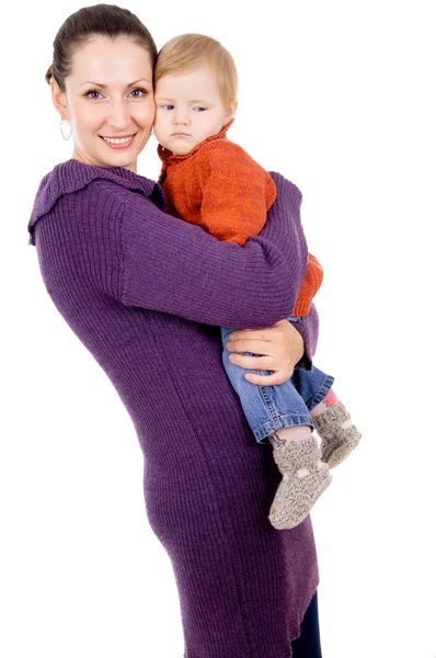 Mother tenderly holding the baby in her arms — Stock Photo, Image