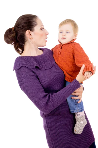 Mother tenderly holding the baby in her arms — Stock Photo, Image