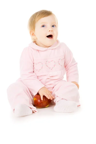 Söt liten baby äter äpple — Stockfoto